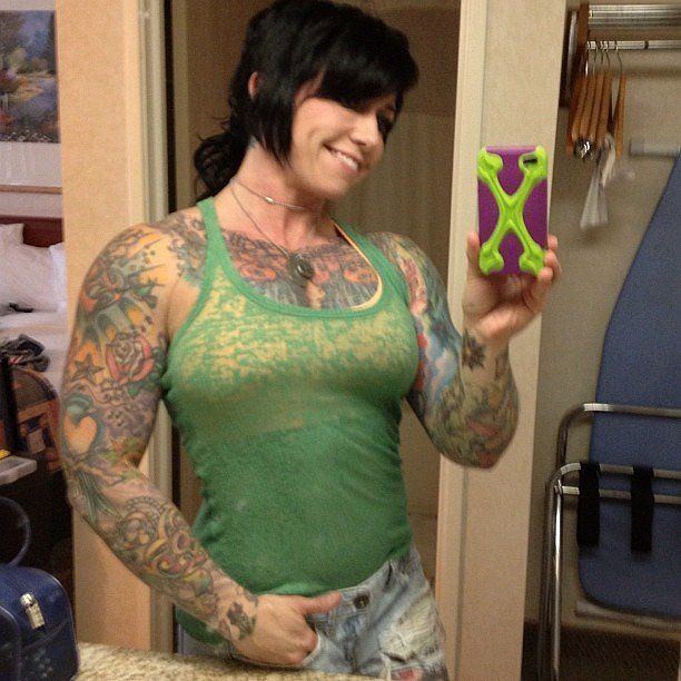 Nude female bodybuilder tattoo