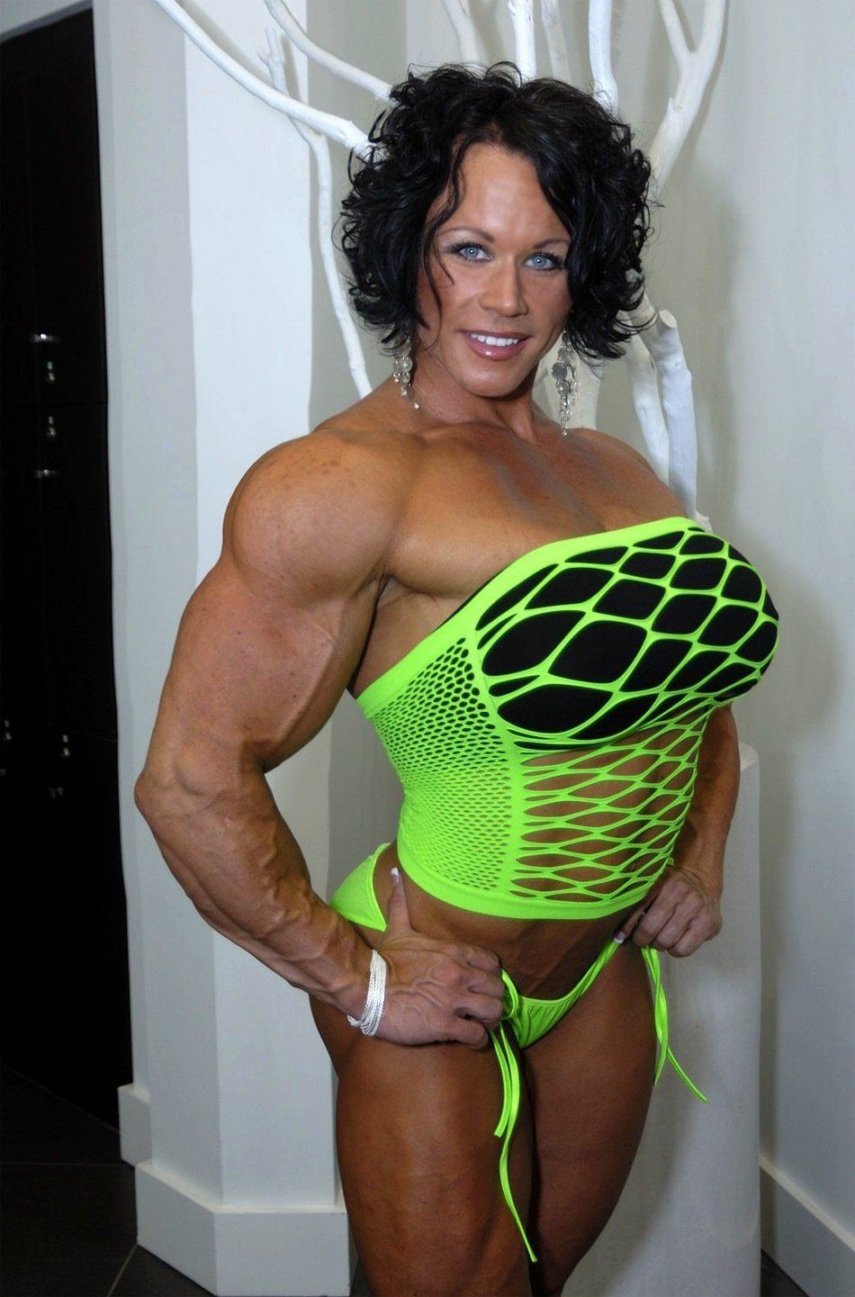 Female Bodybuilder Wearing A Strapon