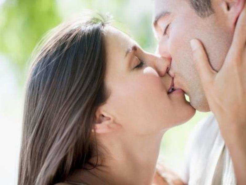 Man kissing woman wildly