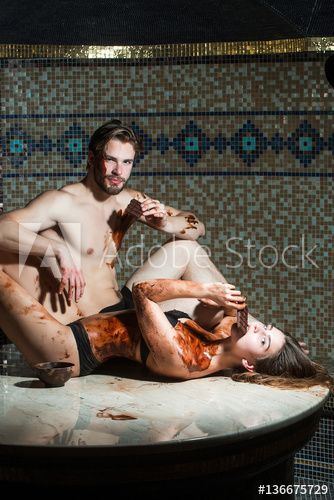 Muscular man getting and erotic massage