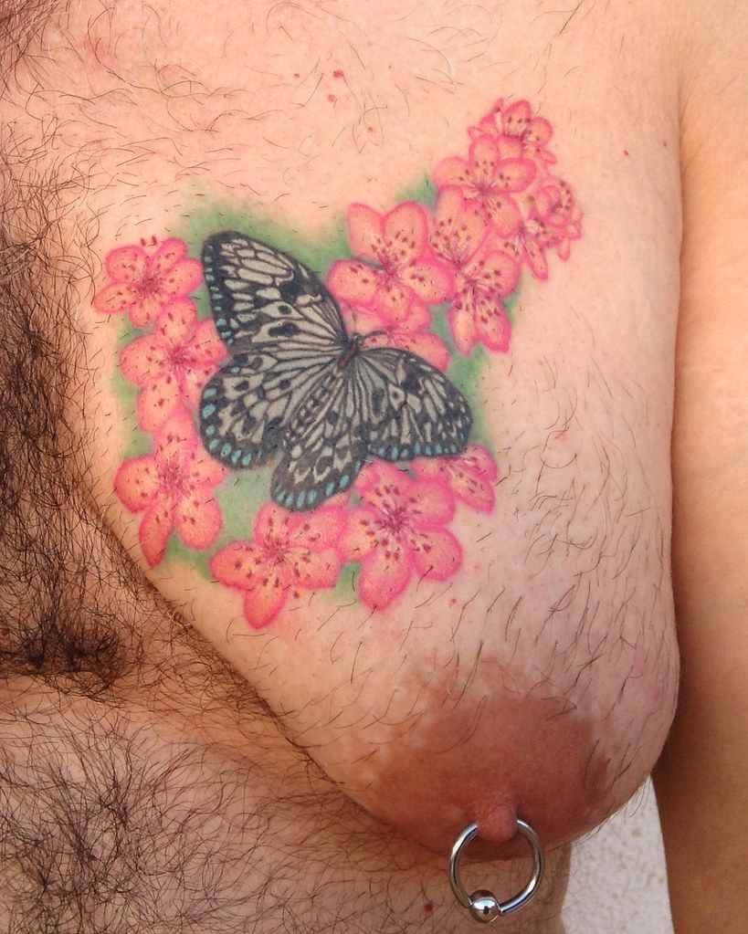 Butterfly boob tatto