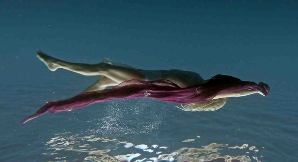 Swimming nude bat girl